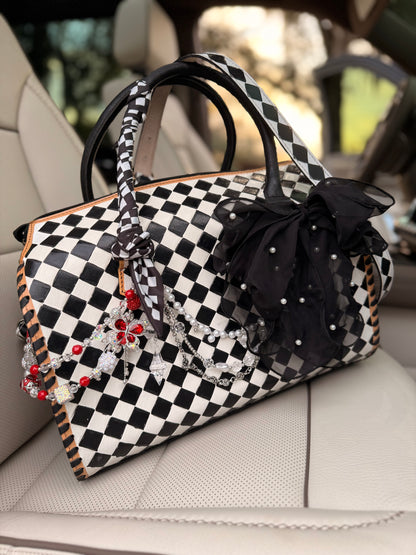 "Black tie chaos”- checker tooled leather speedy Duffle