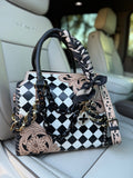 “Starlight Saddle” tooled leather speedy (L)