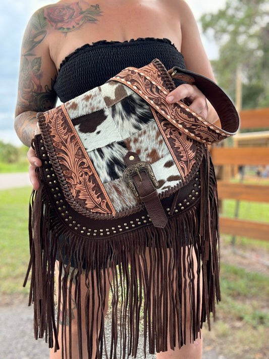 Tooled leather and cowhide purse