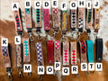 Small keychain tooled wristlet 6.25”