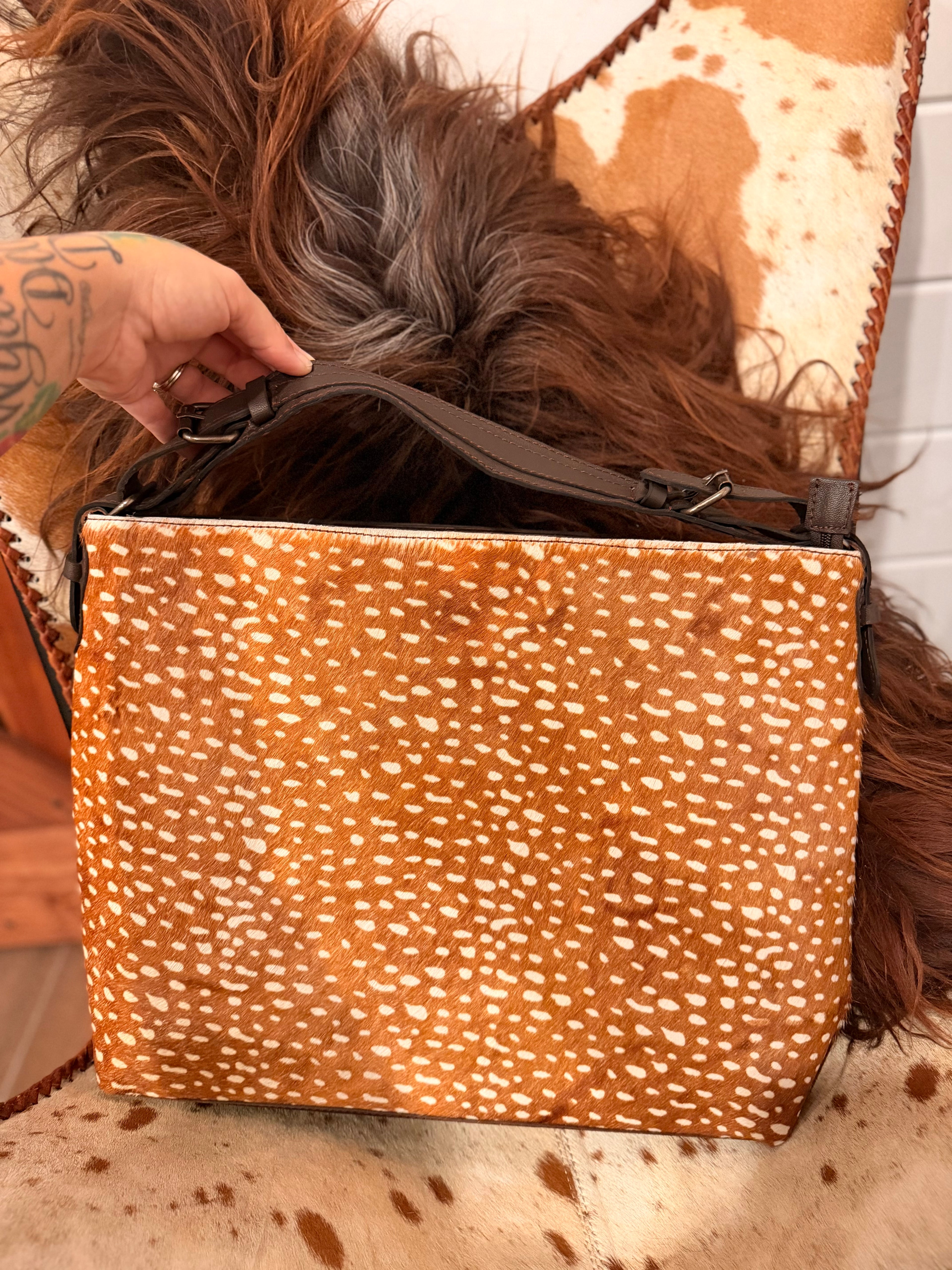 The Prairie Fawn - Bambi cowhide &  leather hobo bag / by The Painted Porches