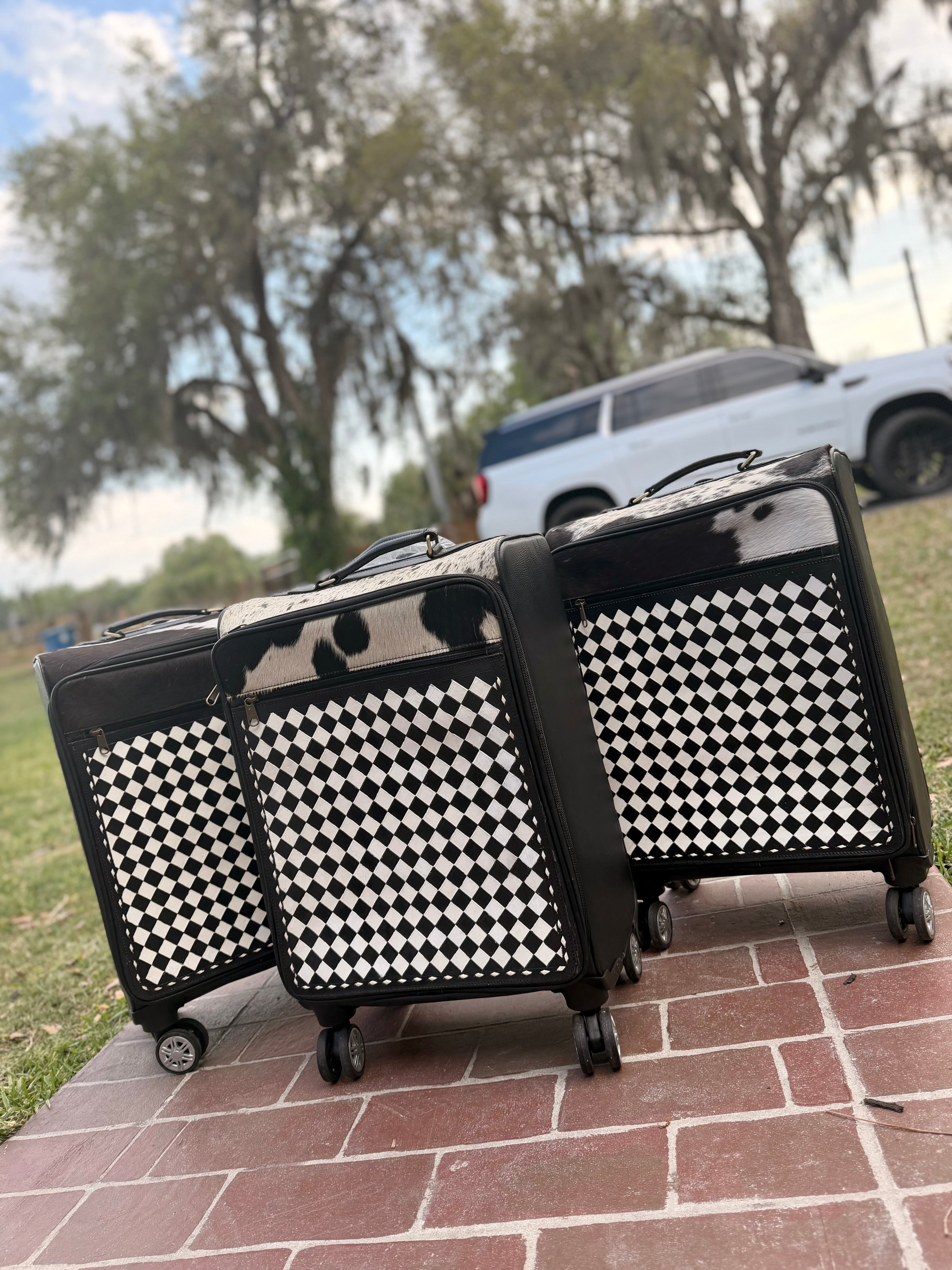 Suitcase - checker tooled leather and cowhide