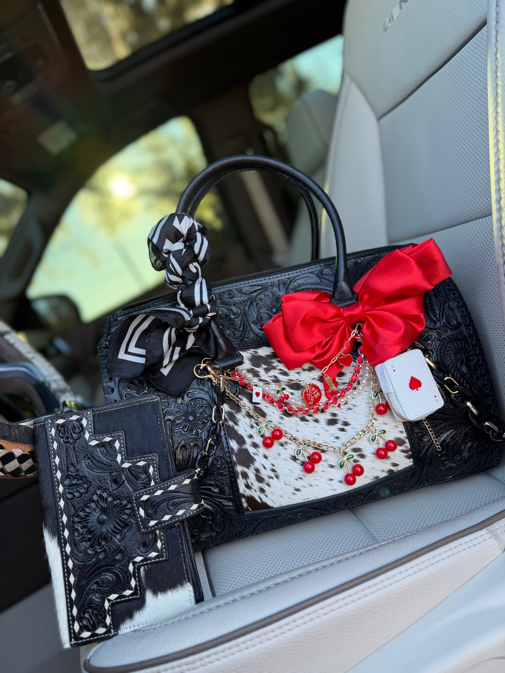 "All Bets on Red" - black tooled leather speedy (Duffle)