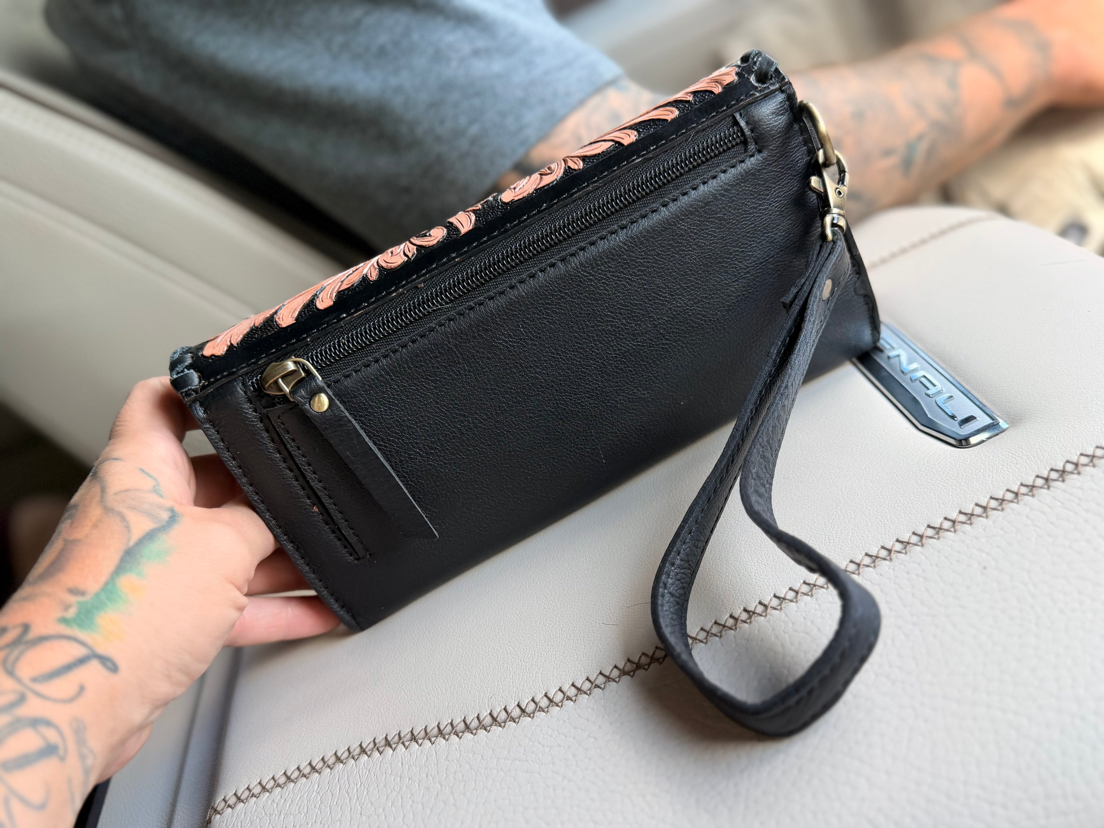 Tooled leather and cowhide wallet