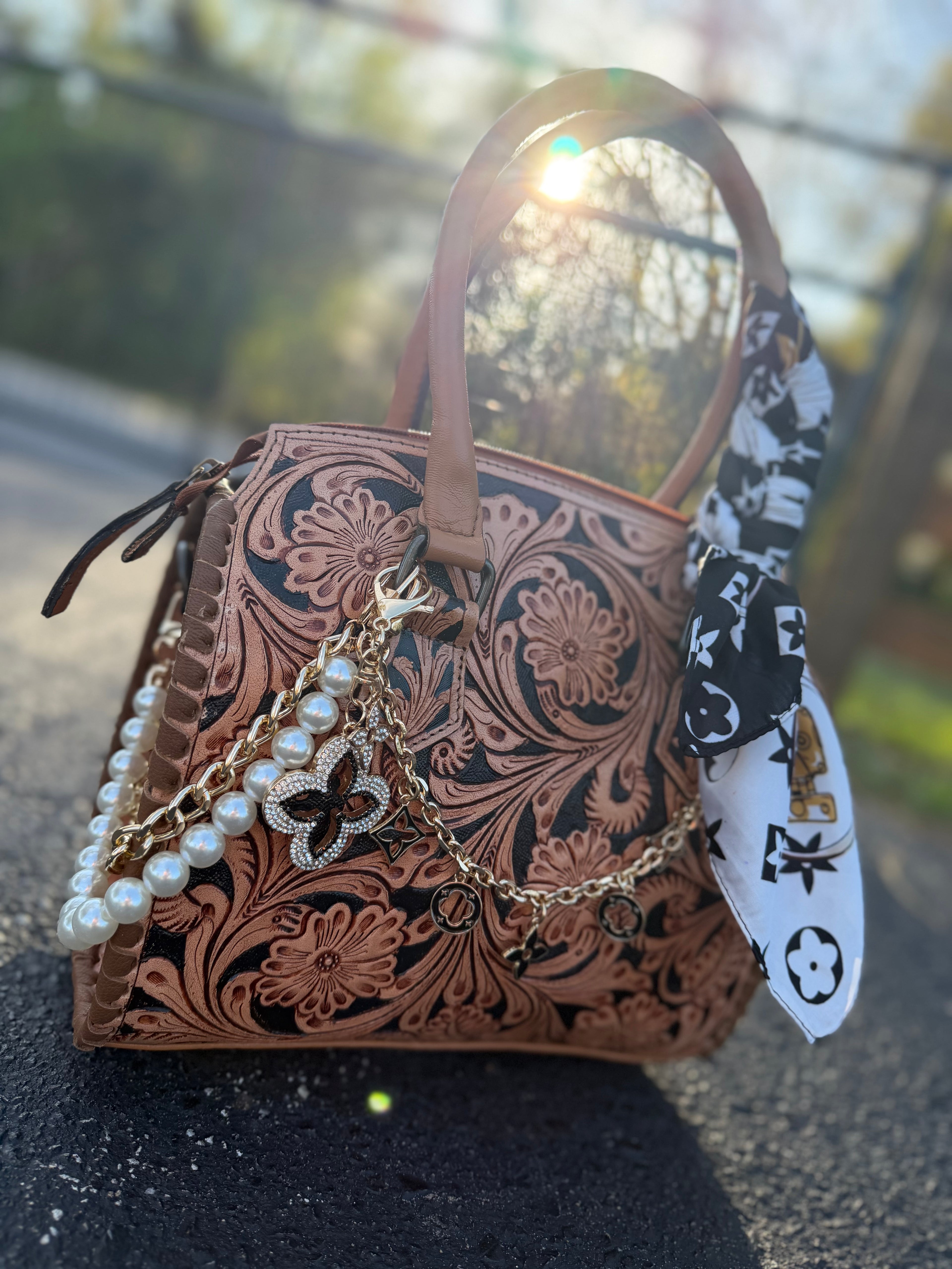 “Cowgirl royalty”- tan and black tooled leather speedy (M)