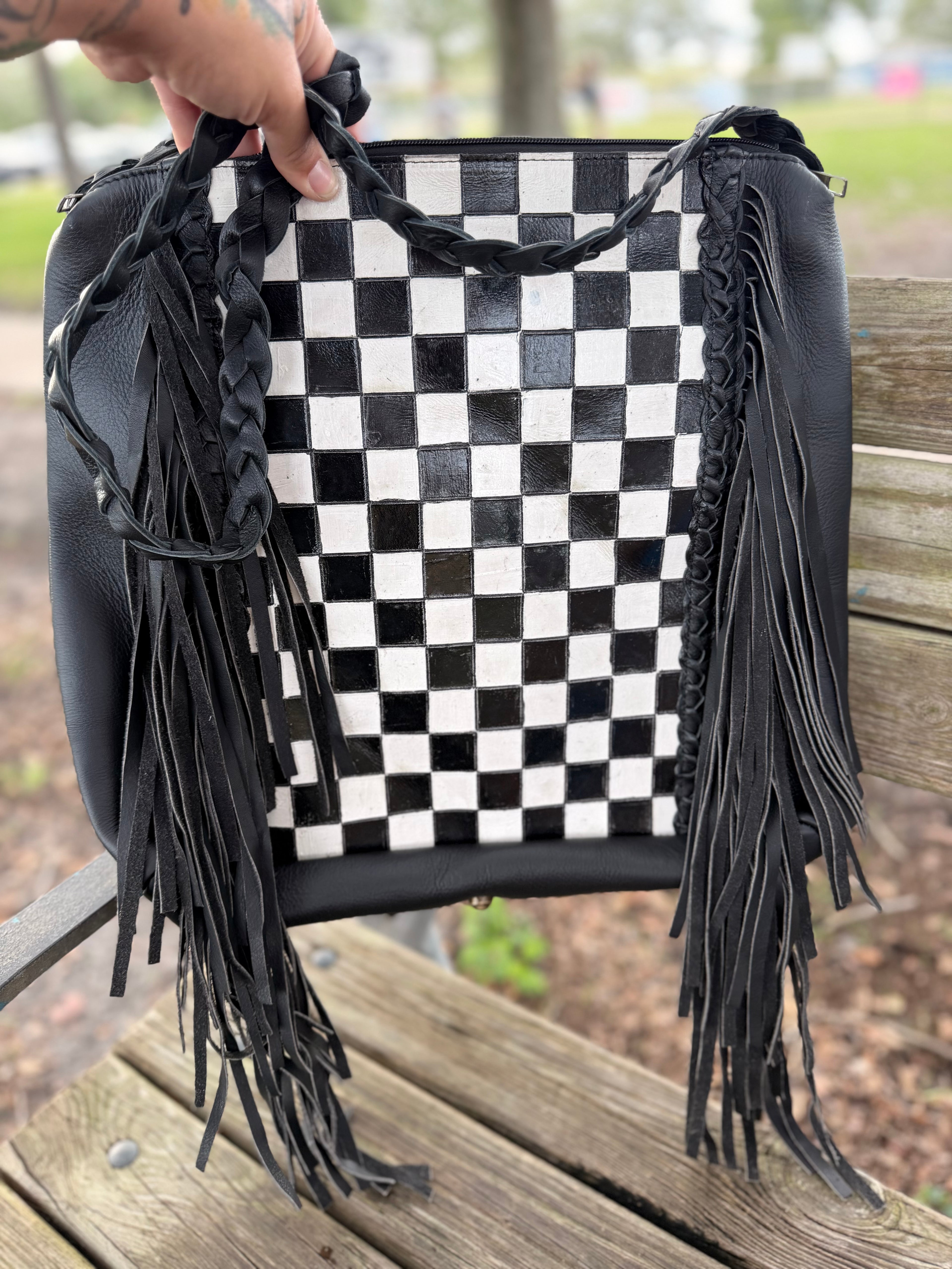 Checker tooled leather hobo bag with fringe