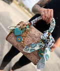 “The Turquoise Wildflower”- white/cream tooled leather speedy (M)