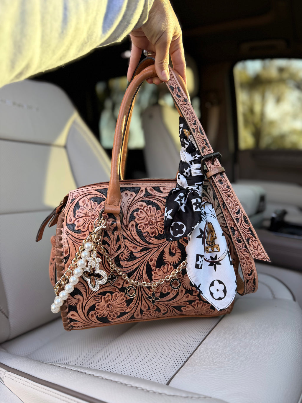 “Cowgirl royalty”- tan and black tooled leather speedy (M)
