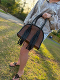 Leather purse with black fringe