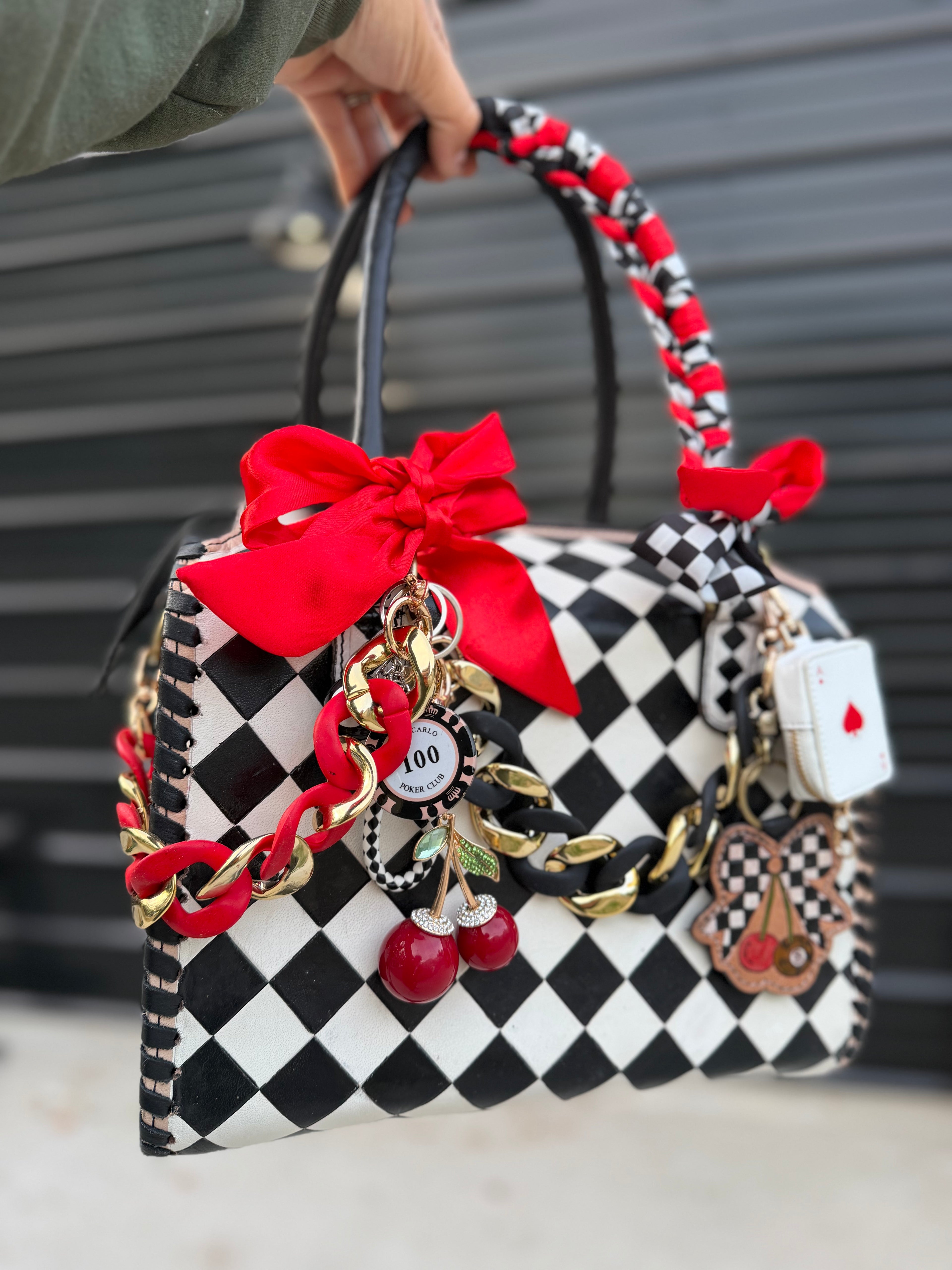 “The Queen of the Casino” tooled checker leather speedy (L)