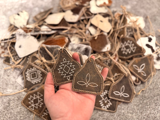 Western stitched, leather and cowhide ornament Western stitched, leather and cowhide ornament 3”