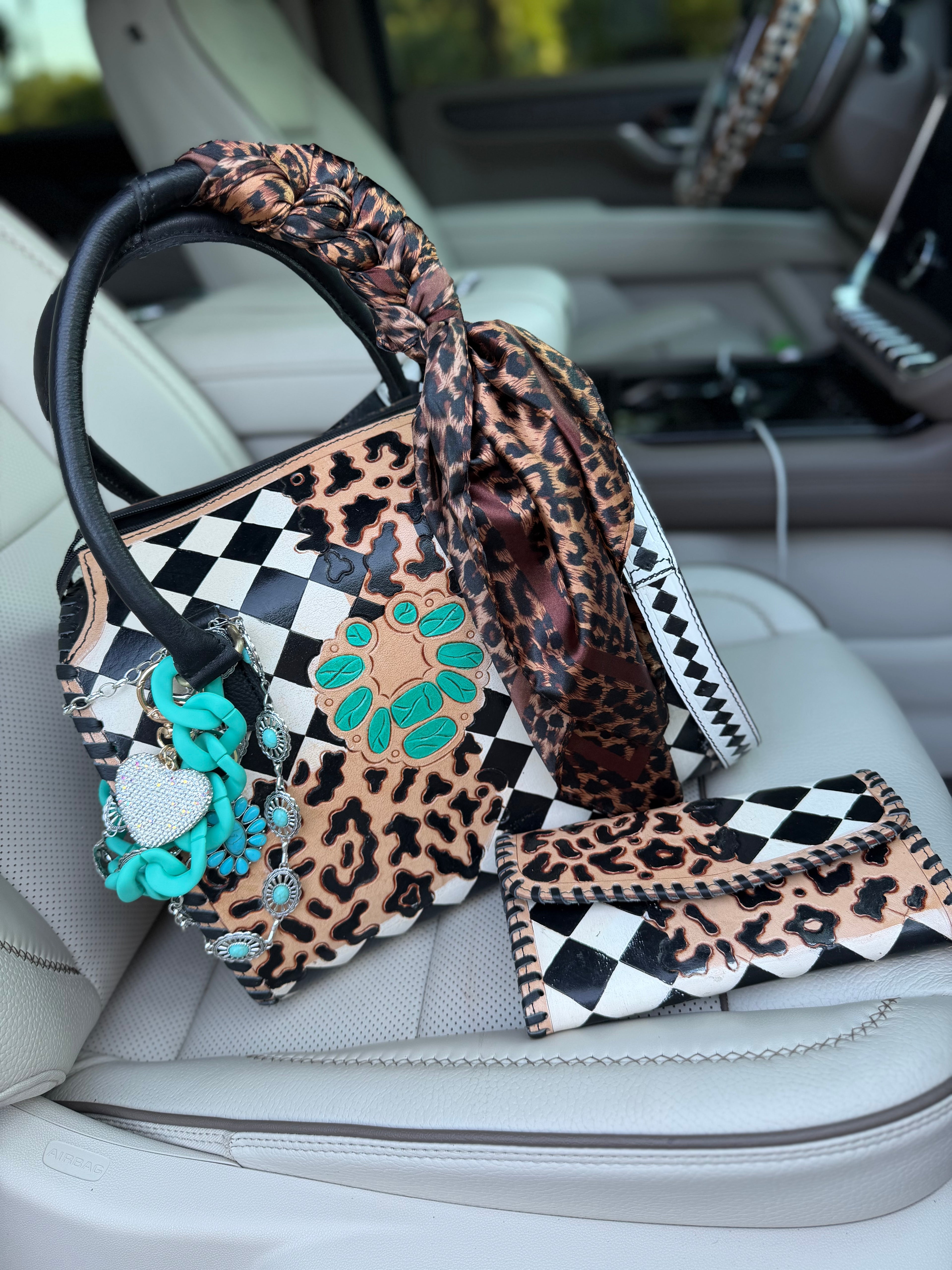 “Outlaw Belle”black/white checker and cheetah tooled leather speedy (L) by the Painted Porches
