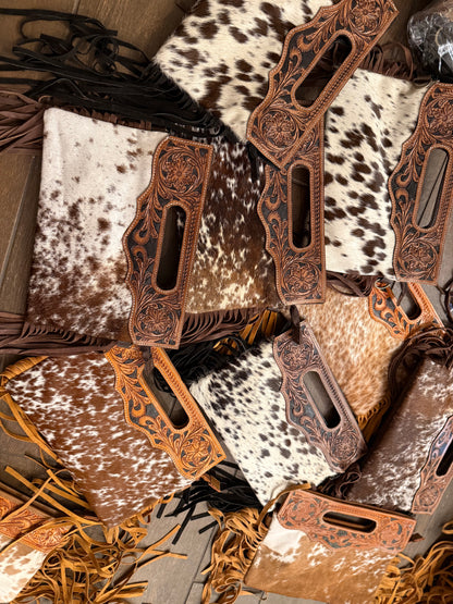 Tooled leather cross body bags comes with long strap