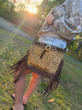 Cheetah print cowhide purse with brown fringe