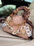 “ The Golden Cowgirl”- white/cream tooled leather speedy (M)