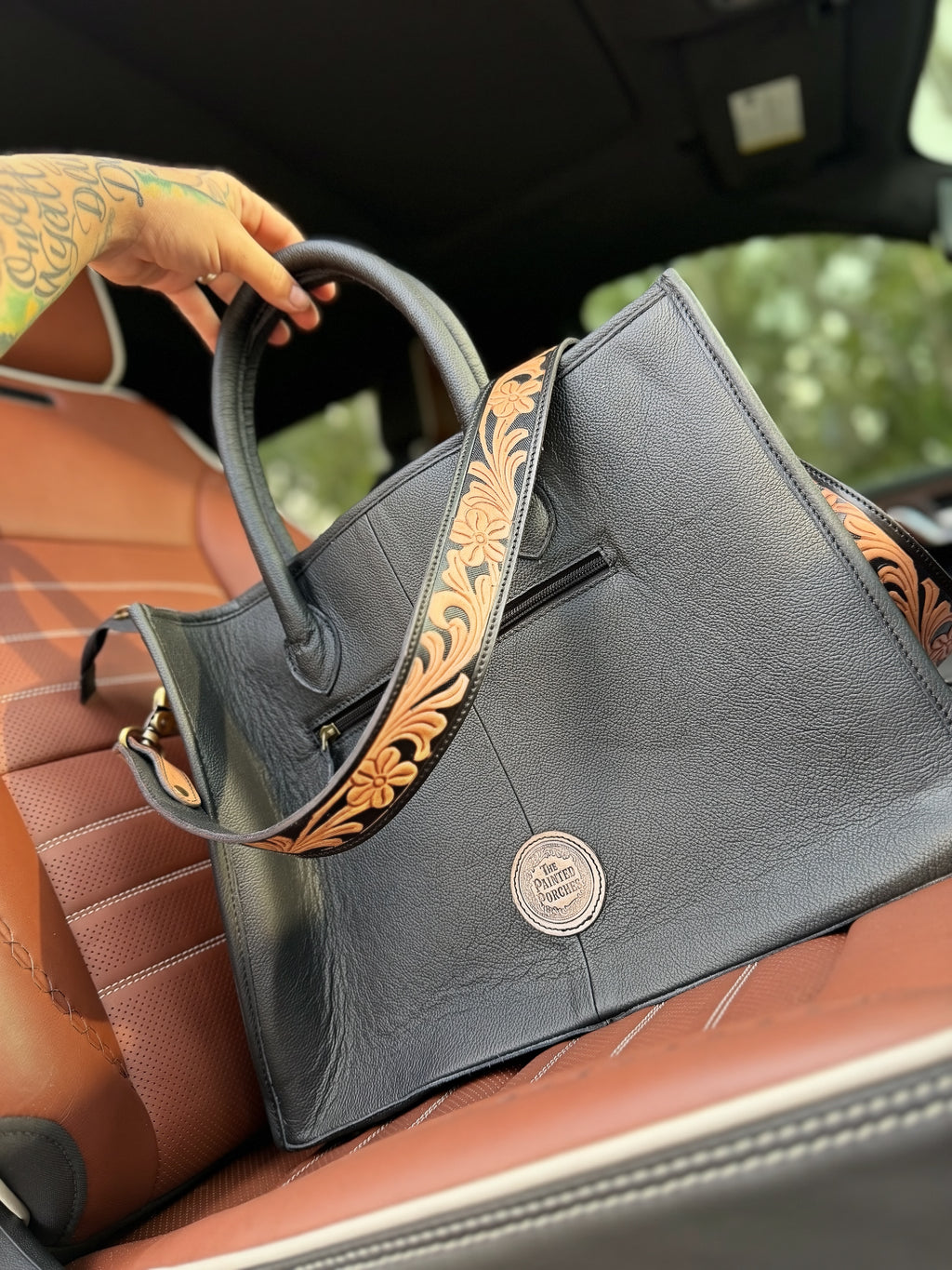 Tooled crossbody / cowhide tote bag