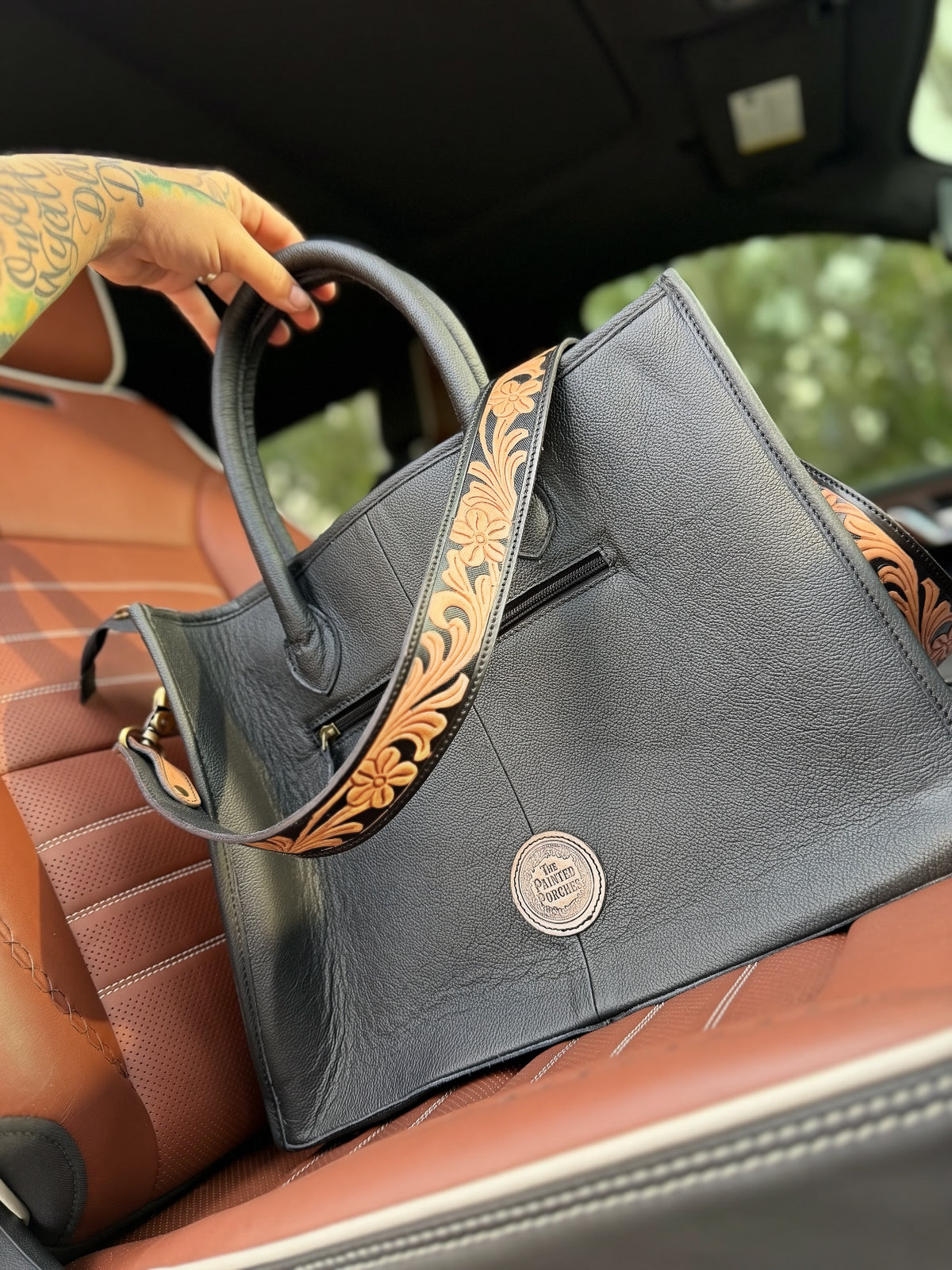 Tooled crossbody / cowhide tote bag