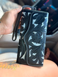 Tooled leather black and white wallet