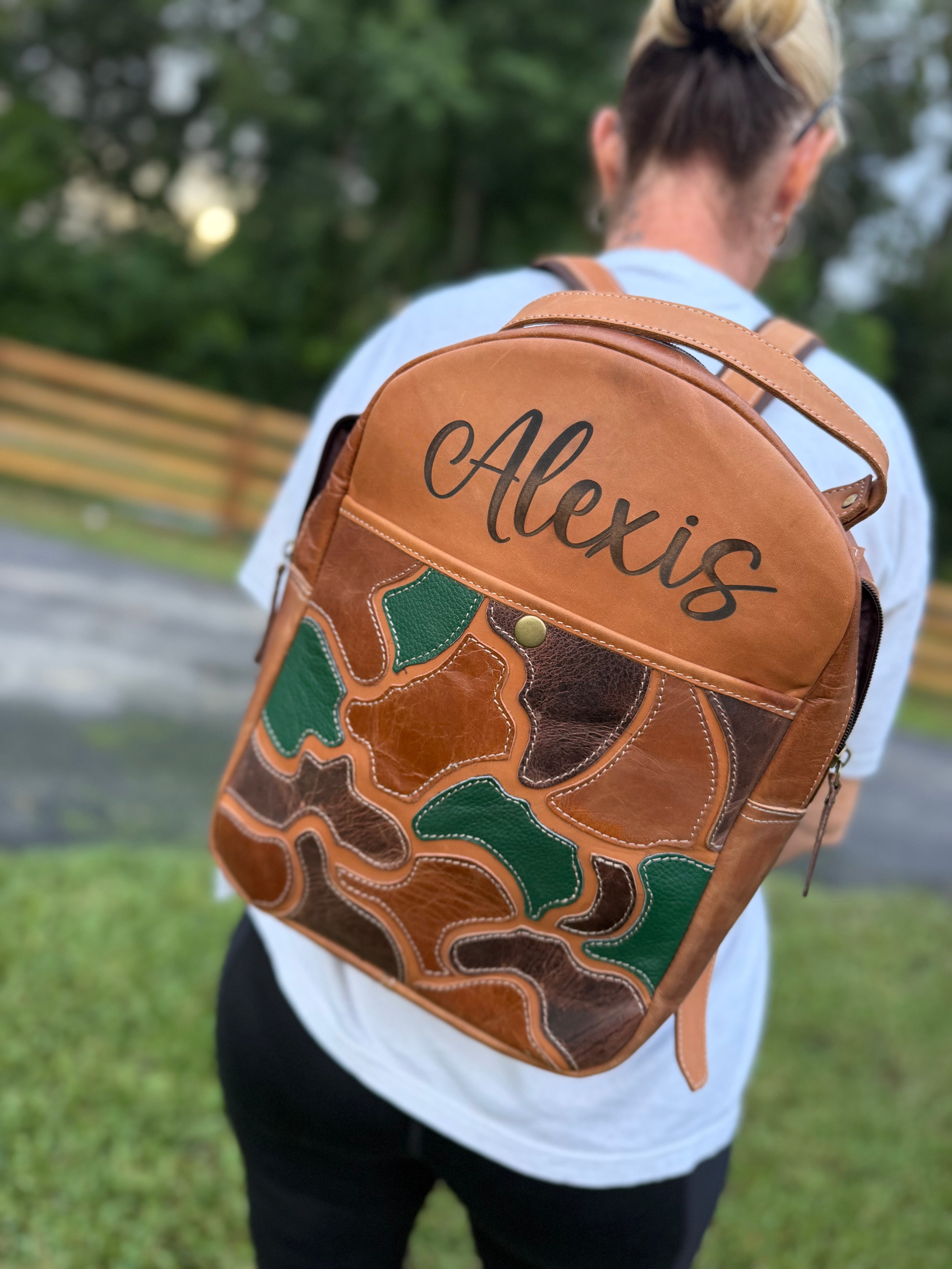 The “Hunter” camo leather bookbag by the Painted Porches