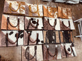 Cowhide and tooled leather purse - 16”x12“