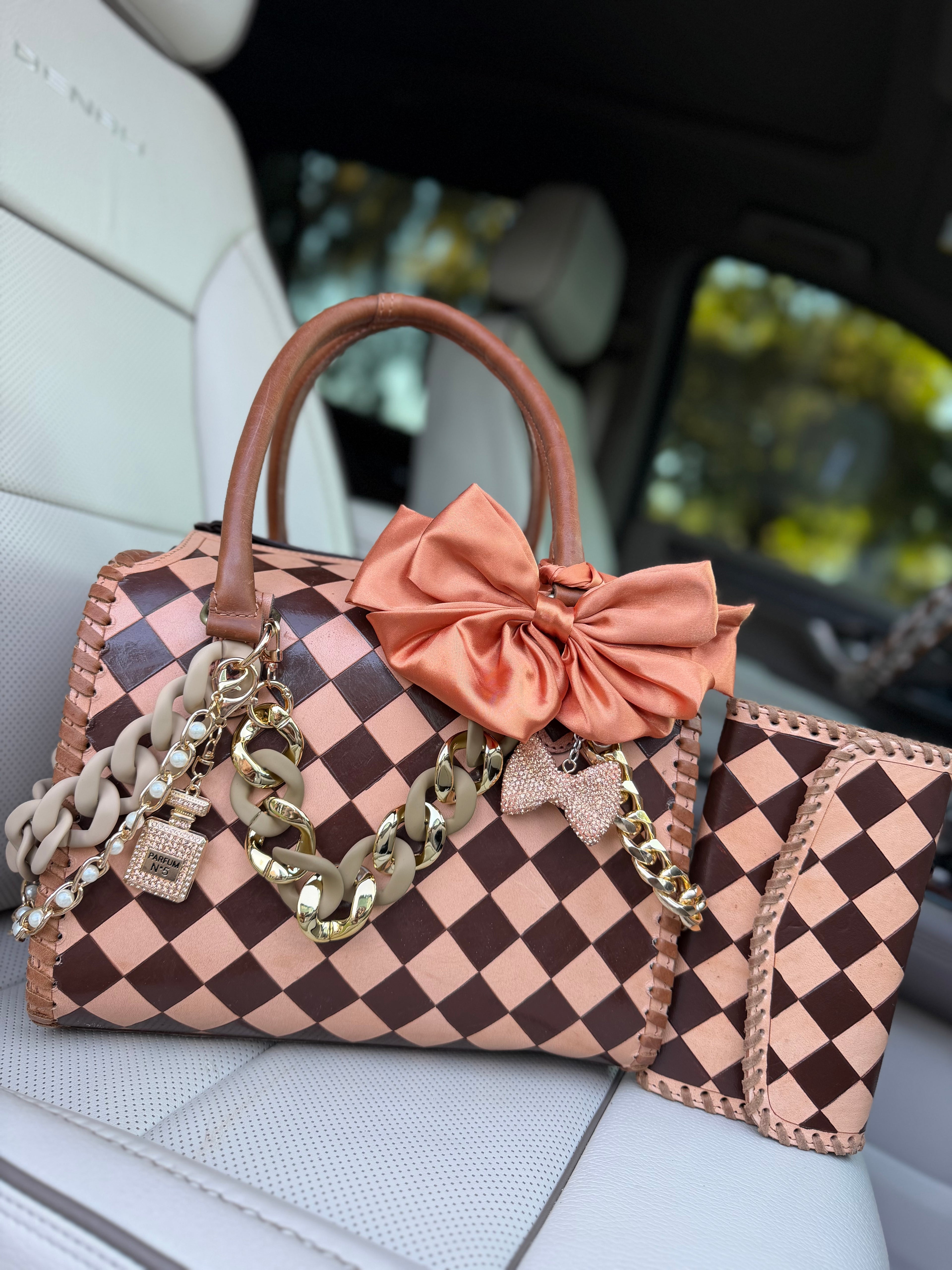 “Southern Queen“ peanut butter checker tooled leather speedy (L) by the Painted Porches