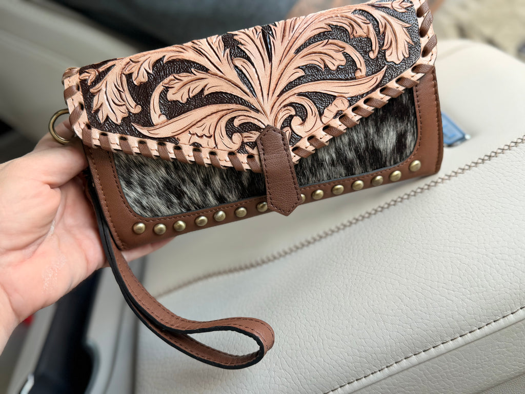 Tooled leather and cowhide wallet