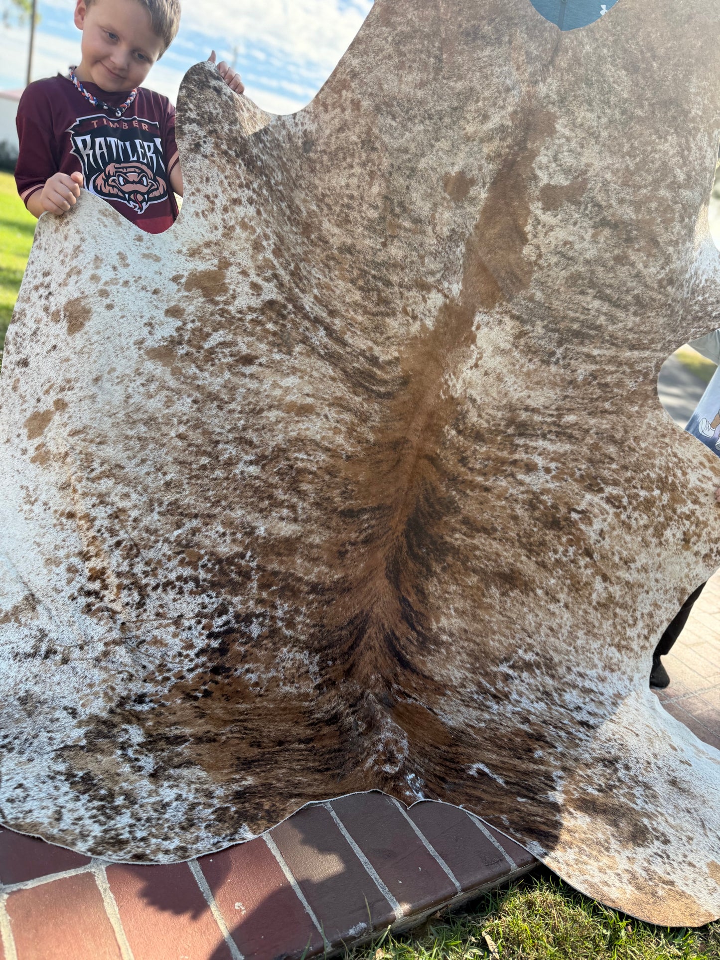 Exotic hide rug (light) 7’9”