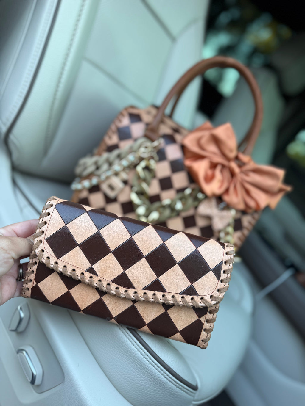 “Southern Queen“ peanut butter checker tooled leather speedy (L) by the Painted Porches
