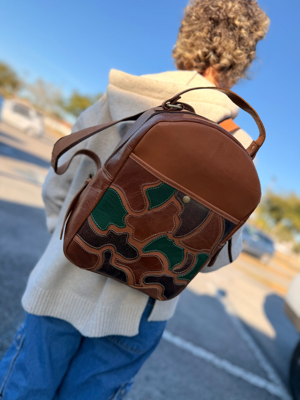 The “Hunter” camo leather bookbag by the Painted Porches