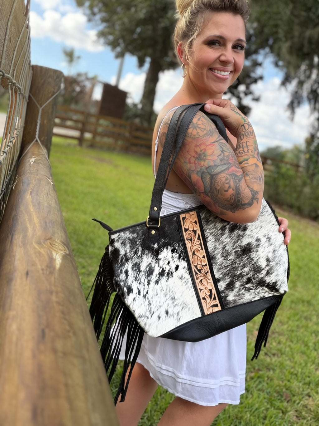 Fringe cowhide purse