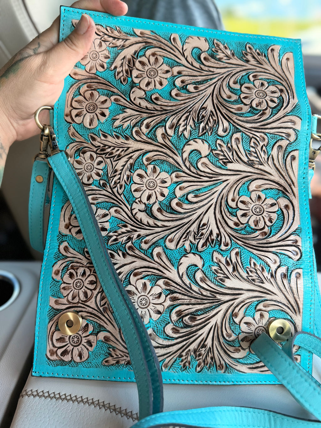 Tooled leather clutch crossbody
