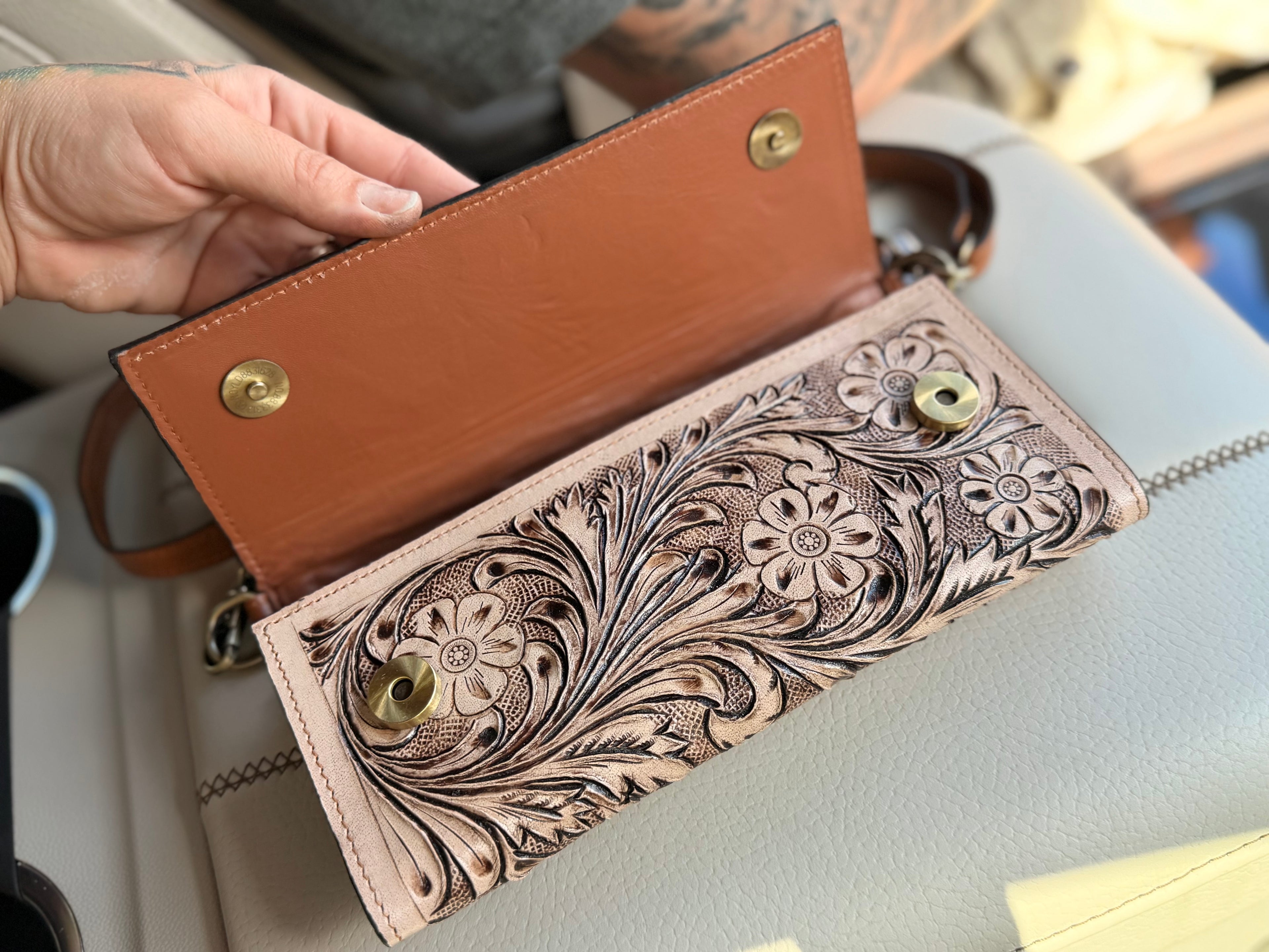 Tooled leather clutch crossbody