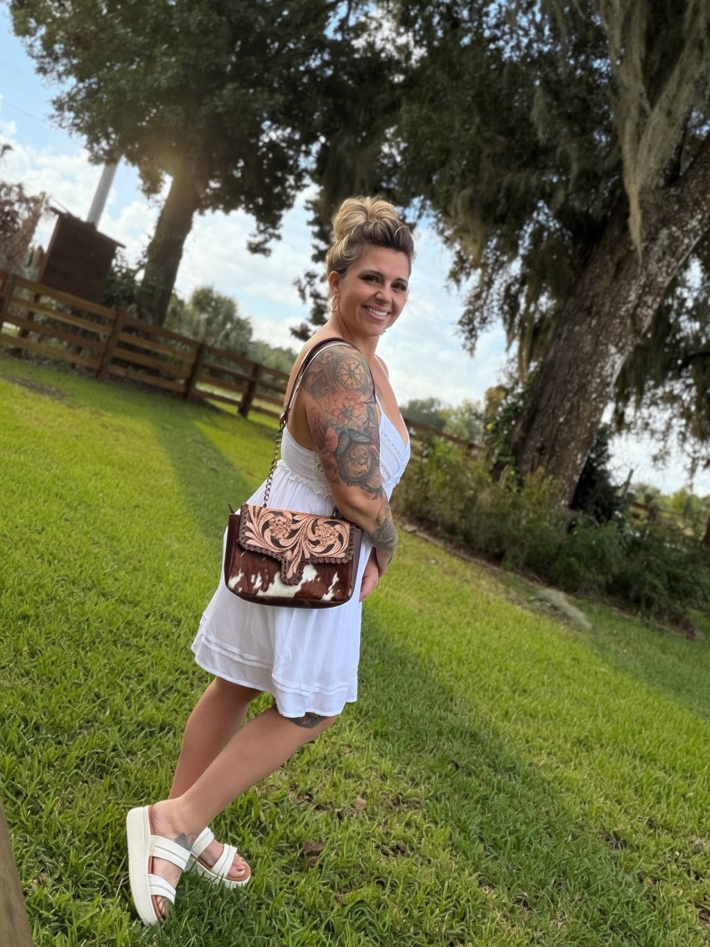 Tooled leather and cowhide crossbody bag