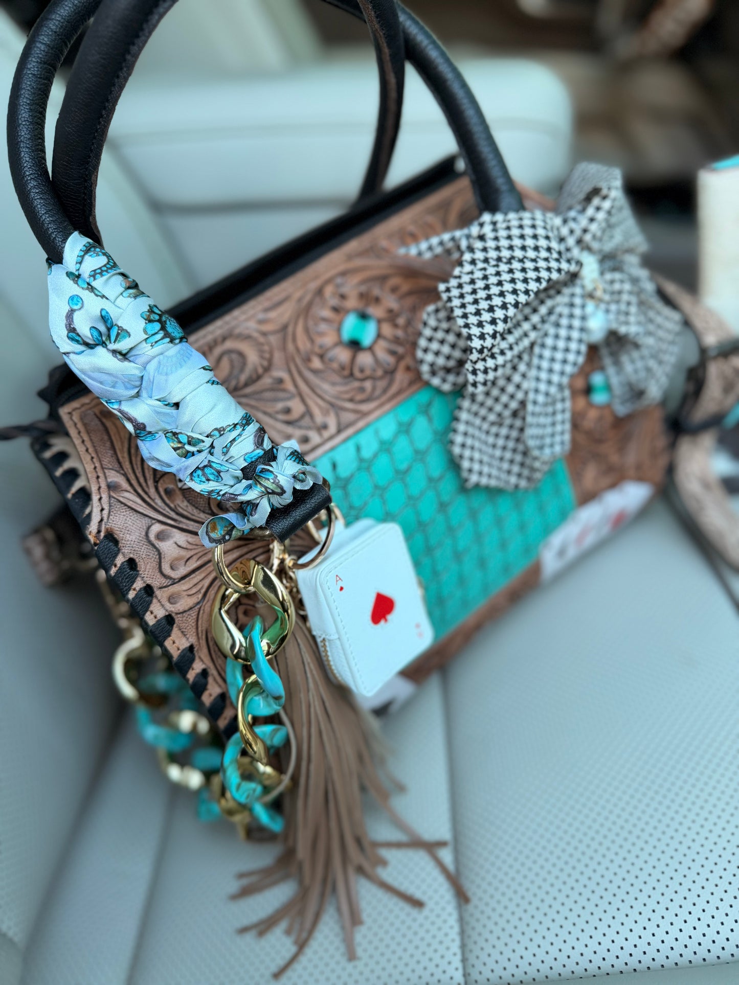 “The Boot Scootin’ Jackpot" - tan tooled leather speedy (M)