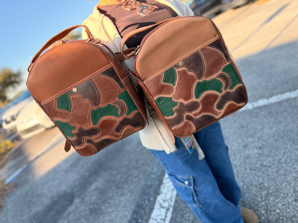 The “Hunter” camo leather bookbag by the Painted Porches