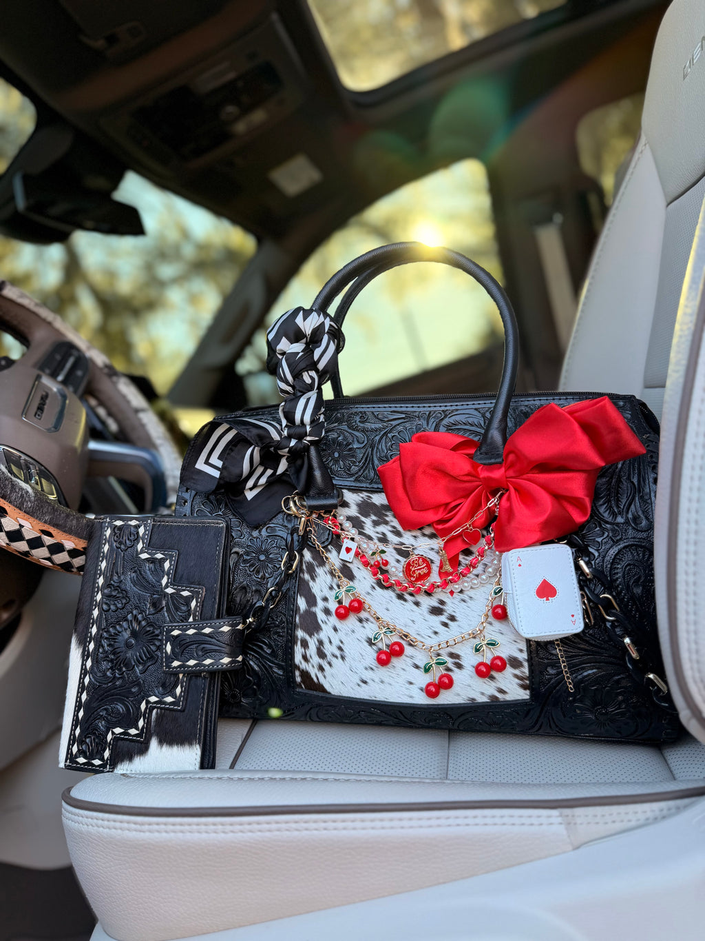"All Bets on Red" - black tooled leather speedy (Duffle)