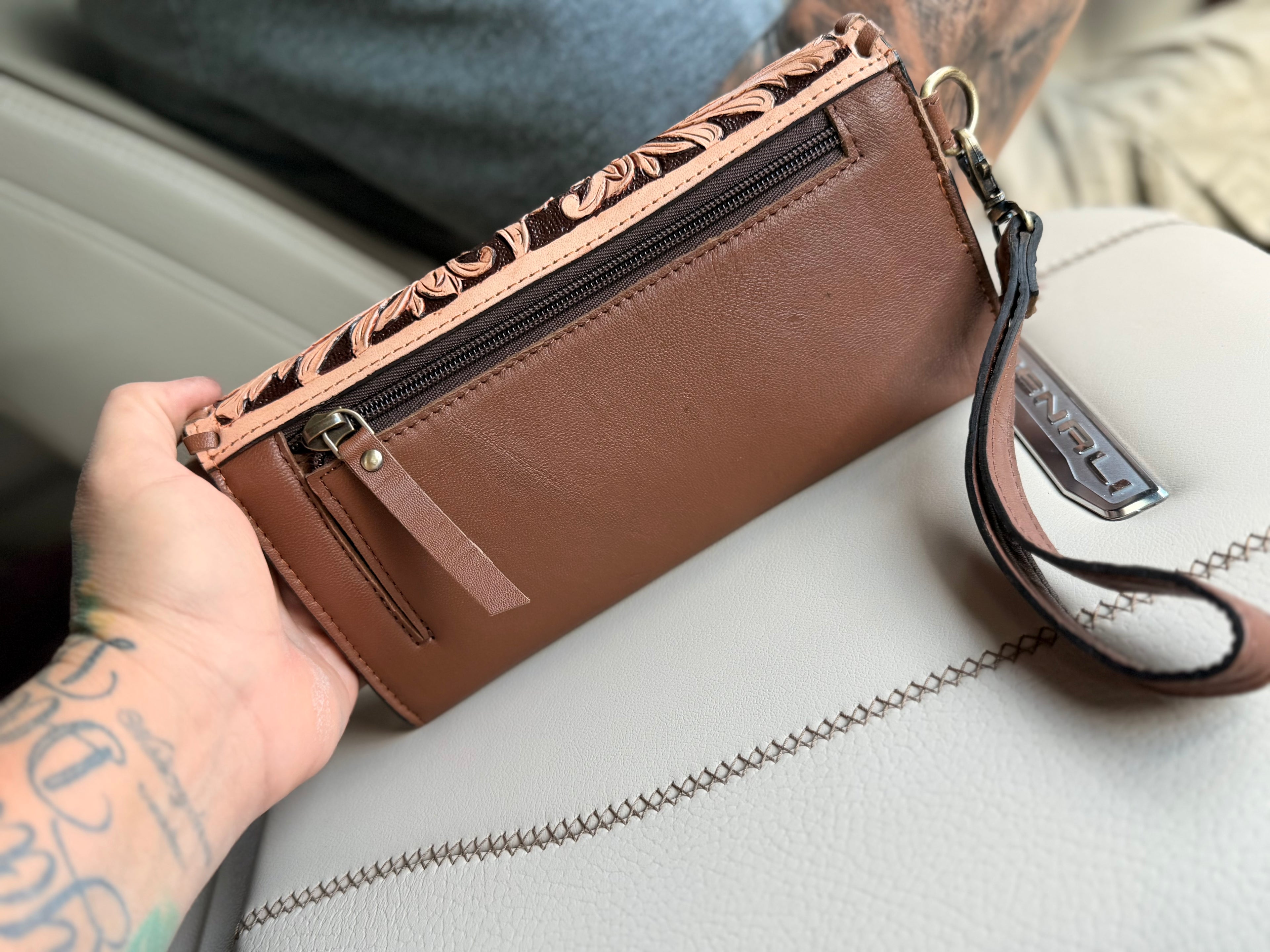 Tooled leather and cowhide wallet