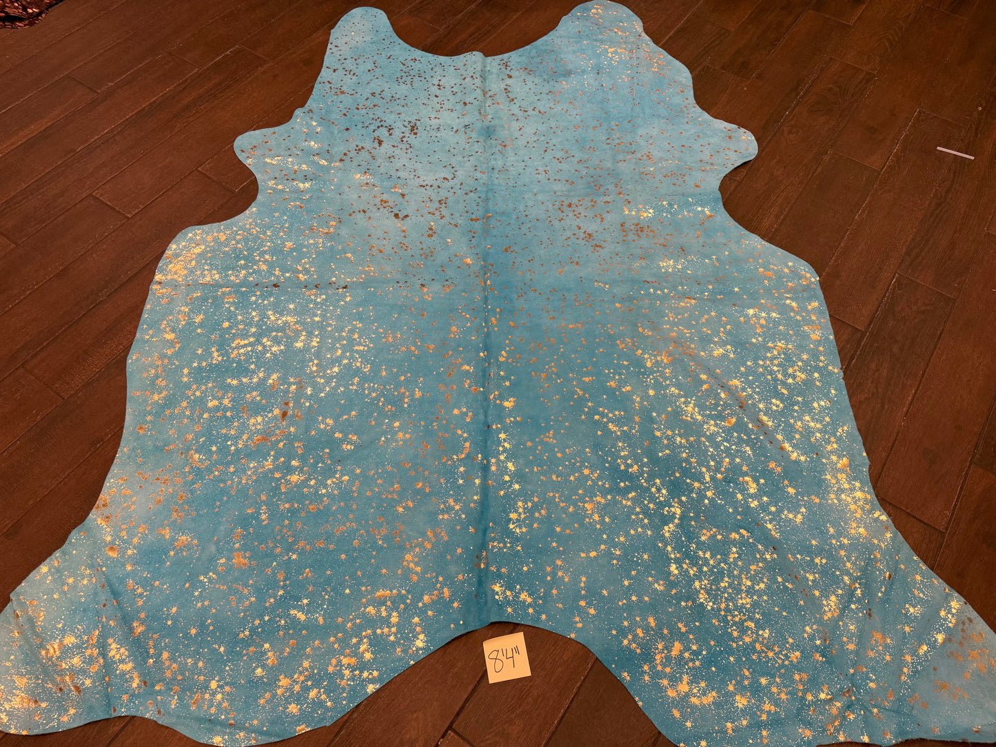 8’4” blue suede cow rug acid wash