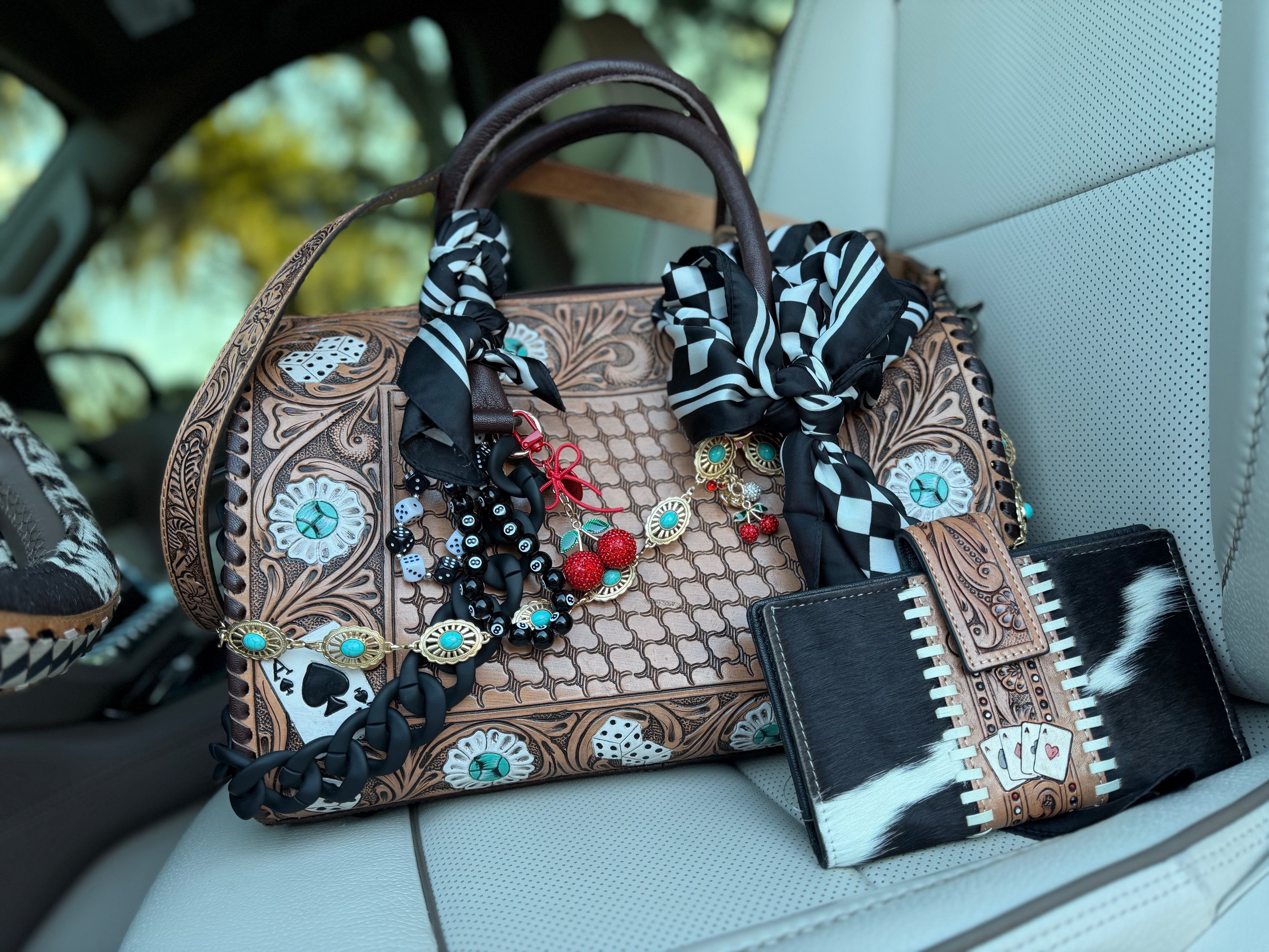 "Winning Jackpot" - brown tooled leather speedy (Duffle) with wallet