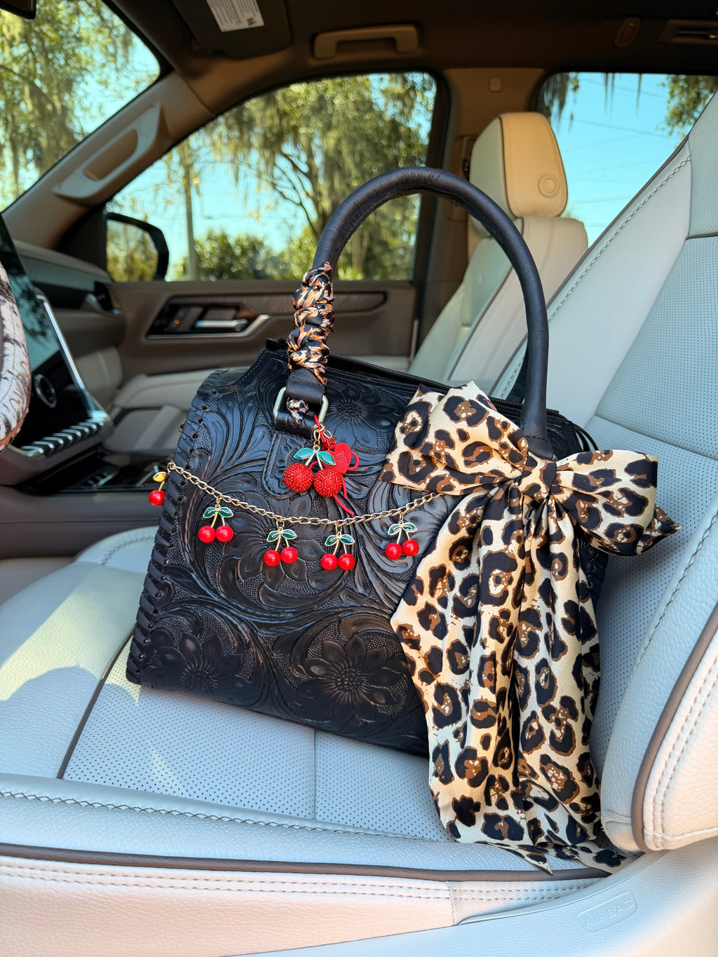 “Leopard Kiss”- black tooled speedy tote, red/cheetah/black accents