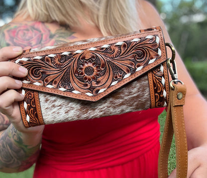 Cowhide tooled leather clutch wristlet