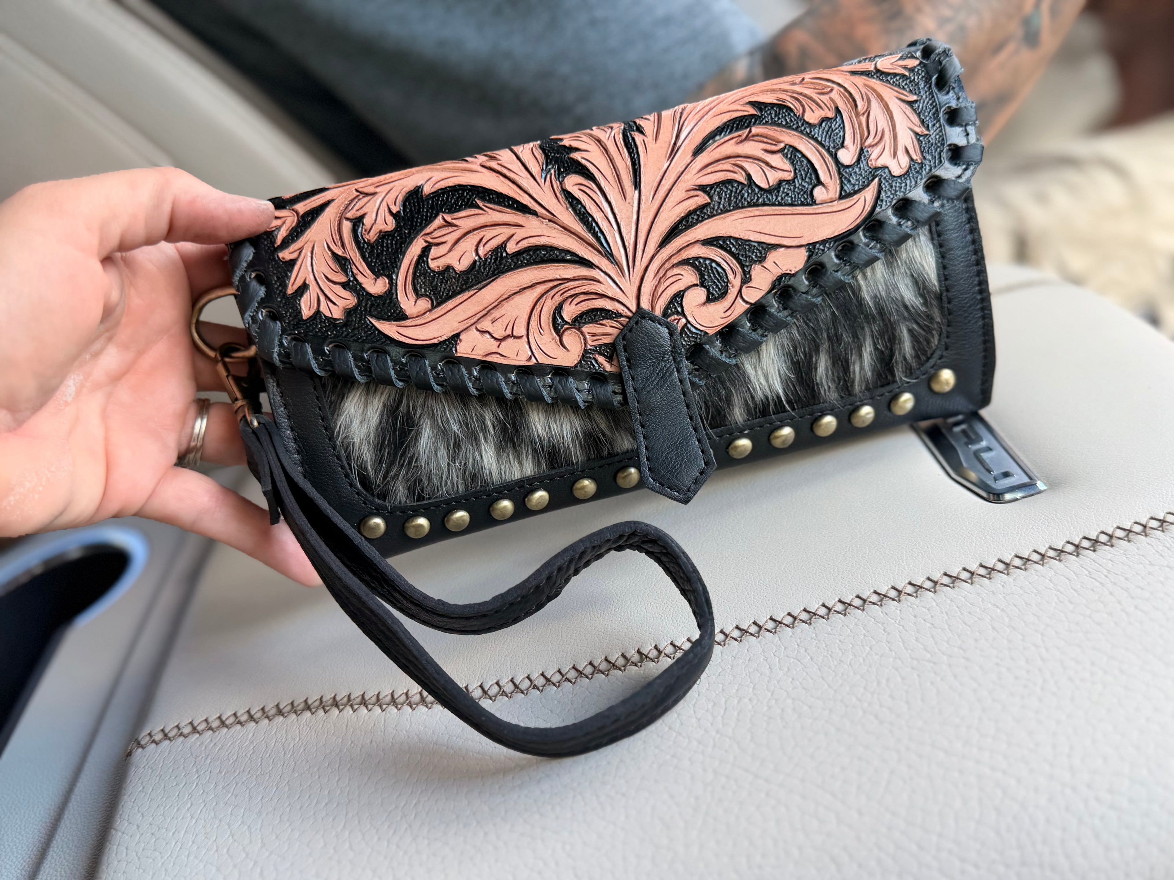 Tooled leather and cowhide wallet
