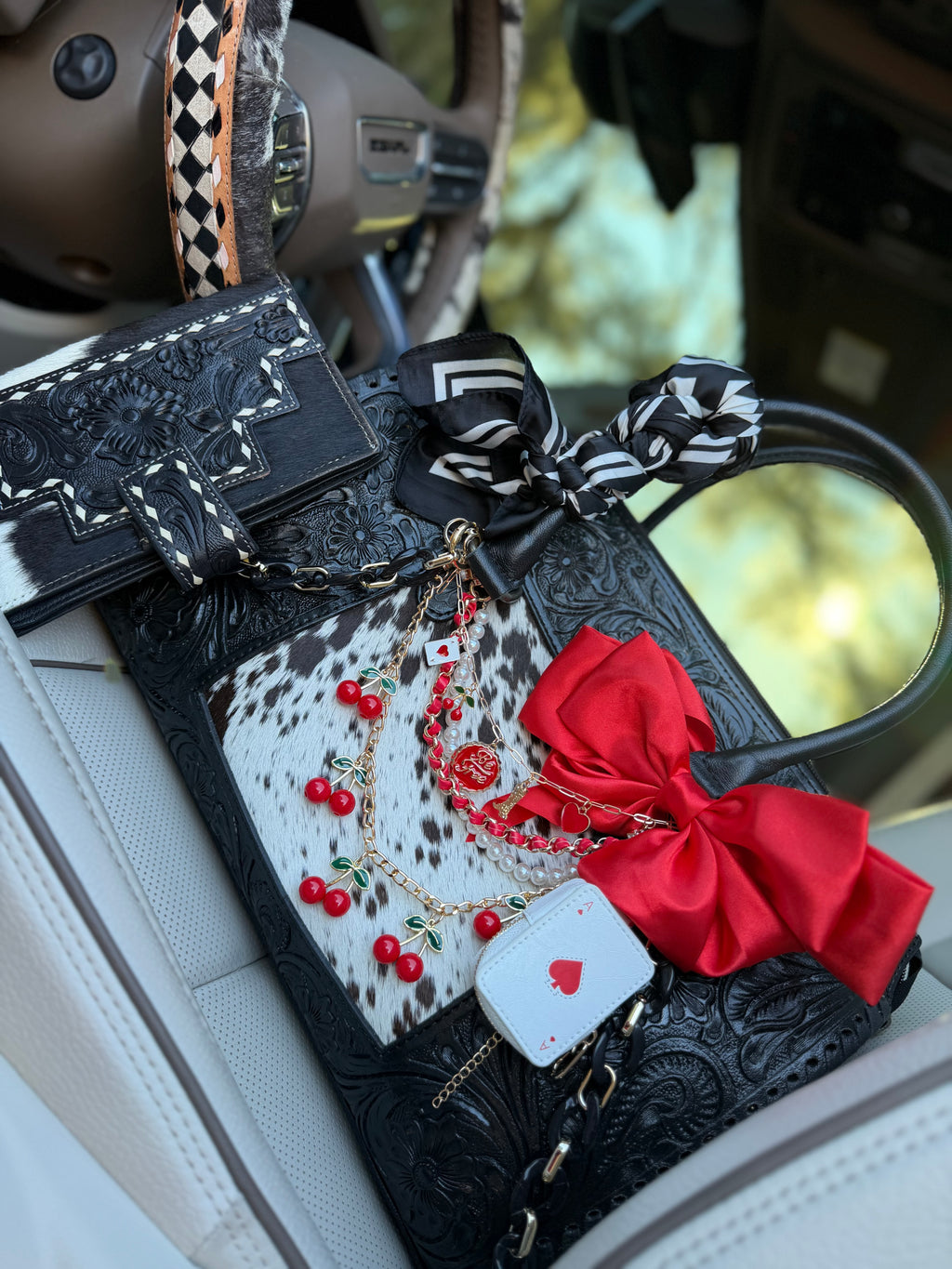 "All Bets on Red" - black tooled leather speedy (Duffle)