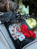 "All Bets on Red" - black tooled leather speedy (Duffle)