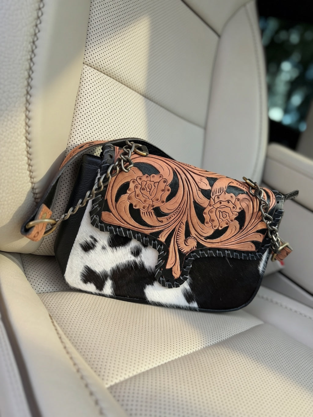 Tooled leather and cowhide crossbody bag