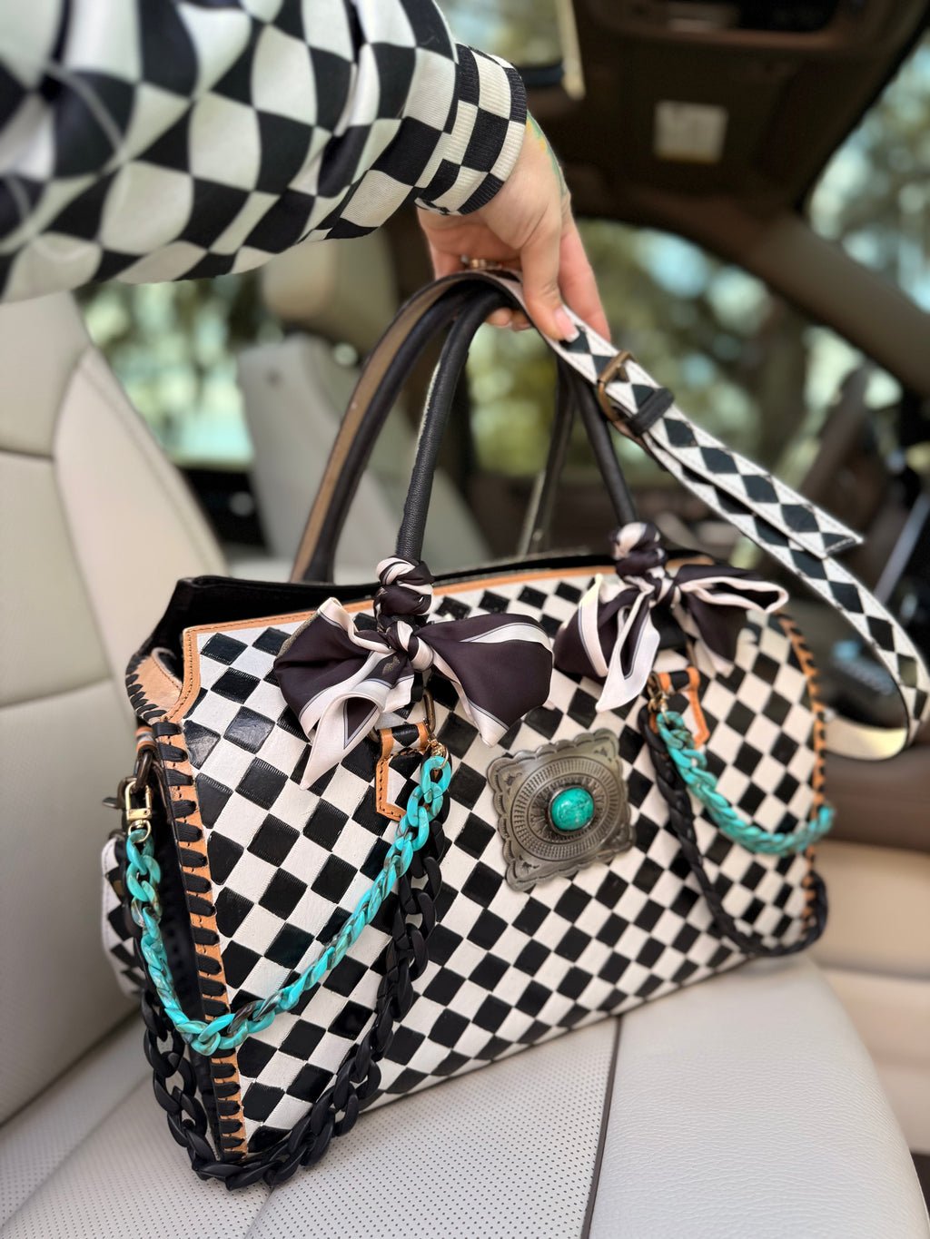 "Risk Taker" - checker tooled leather speedy Duffle