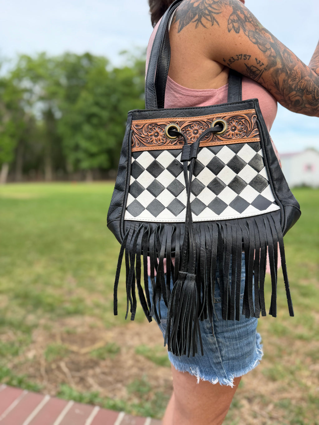Checker sling bag with fringe