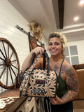 777 tooled leather speedy (M)