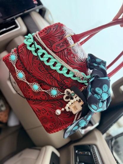 “Ruby Ranch Royalty” tooled leather speedy (L)