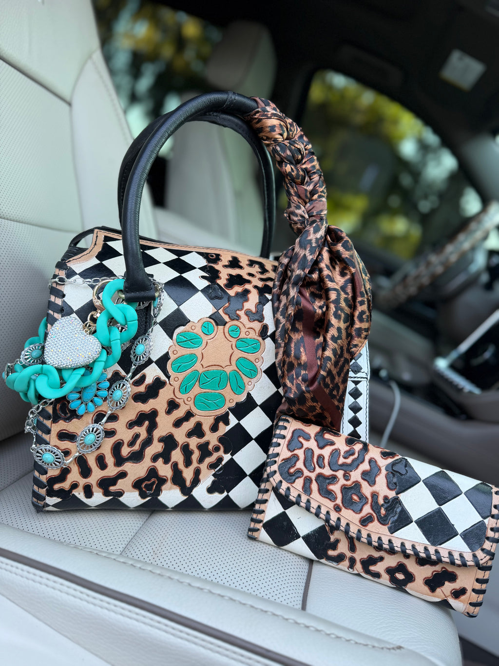 “Outlaw Belle”black/white checker and cheetah tooled leather speedy (L) by the Painted Porches